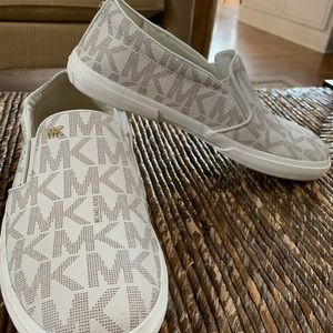 White and Gold Micheal Khors Slip on Sneakers